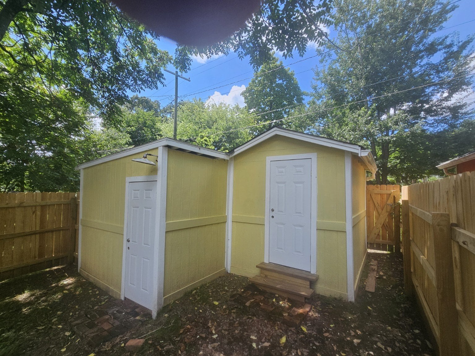 Detached two-door flex-use building in the backyard